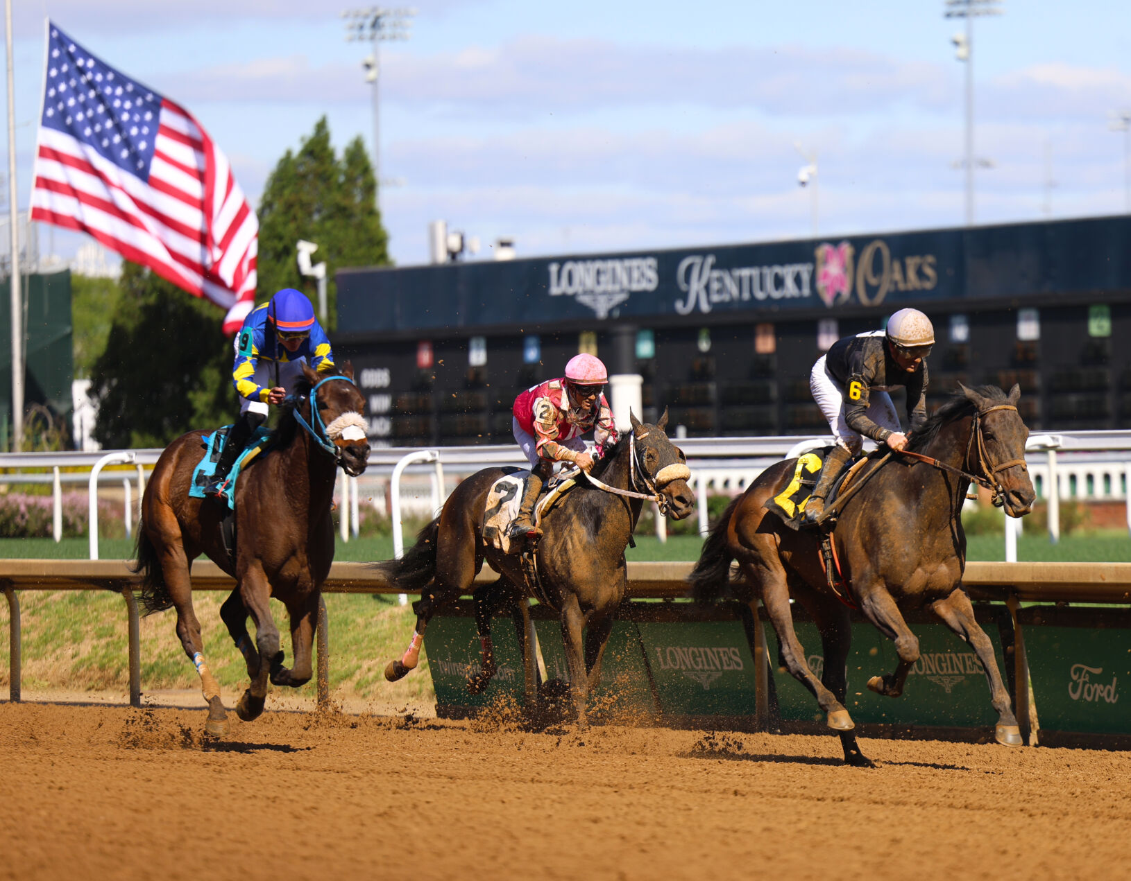 American flag in background of Opening Night race.JPG